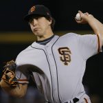San Francisco Giants starting pitcher Derek Holland throws against the Arizona Diamondbacks during the first inning of a baseball game Sunday, July 1, 2018, in Phoenix. (AP Photo/Ross D. Franklin)