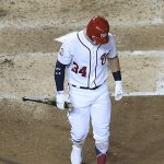 Washington Nationals outfielder Bryce Harper (34) walks out of the batters box after striking out in the fourth inning at the Major League Baseball All-star Game, Tuesday, July 17, 2018 in Washington. (AP Photo/Nick Wass)