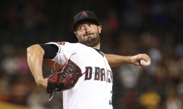 Arizona Diamondbacks' Robbie Ray pitches to the Colorado Rockies during the first inning of a baseb...