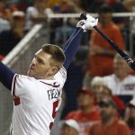 Atlanta Braves Freddie Freeman (5) watches his hit during the MLB Home Run Derby, at Nationals Park, Monday, July 16, 2018 in Washington. The 89th MLB baseball All-Star Game will be played Tuesday. (AP Photo/Patrick Semansky)