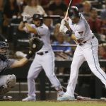 Arizona Diamondbacks' A.J. Pollock, right, stands at the plate after being hit by a pitch as San Diego Padres catcher Austin Hedges, left, catches the inside throw during the sixth inning of a baseball game Friday, July 6, 2018, in Phoenix. (AP Photo/Ross D. Franklin)