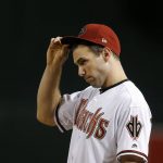 Arizona Diamondbacks first baseman Paul Goldschmidt adjusts his cap during the sixth inning of the team's baseball game against the San Diego Padres on Thursday, July 5, 2018, in Phoenix. (AP Photo/Ross D. Franklin)