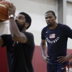 Kevin Durant, right, watches Kyrie Irving during a training camp for USA Basketball, Thursday, July 26, 2018, in Las Vegas. (AP Photo/John Locher)
