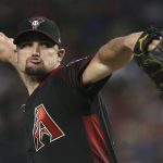 Arizona Diamondbacks starting pitcher Zack Godley throws against the Colorado Rockies during the first inning of a baseball game, Saturday, July 21, 2018, in Phoenix. (AP Photo/Ralph Freso)