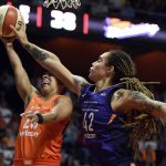 Phoenix Mercury center Brittney Griner (42) blocks the shot of Connecticut Sun guard Layshia Clarendon (23) during the first half of a WNBA basketball game Friday, July 13, 2018, in Uncasville, Conn.. (Sean D. Elliot/The Day via AP)