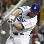 Los Angeles Dodgers Max Muncy (13) hits during the MLB Home Run Derby, at Nationals Park, Monday, July 16, 2018 in Washington. The 89th MLB baseball All-Star Game will be played Tuesday. (AP Photo/Patrick Semansky)