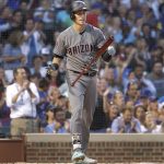 Arizona Diamondbacks' Jake Lamb reacts after striking out with the bases loaded to end the top half of the third inning against the Chicago Cubs in a baseball game Tuesday, July 24, 2018, in Chicago. (AP Photo/Charles Rex Arbogast)