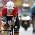 Luxembourg's Bob Jungels crosses the finish line of the twentieth stage of the Tour de France cycling race, an individual time trial over 31 kilometers (19.3 miles)with start in Saint-Pee-sur-Nivelle and finish in Espelette, France, Saturday July 28, 2018. (AP Photo/Christophe Ena )