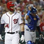 Washington Nationals outfielder Bryce Harper (34) walks off the field after striking out in the fourth inning of the Major League Baseball All-star Game, Tuesday, July 17, 2018 in Washington. (AP Photo/Alex Brandon)