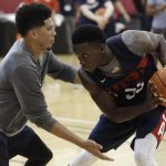 Devin Booker, left, guards Victor Oladipo during a training camp for USA Basketball, Friday, July 27, 2018, in Las Vegas. (AP Photo/John Locher)