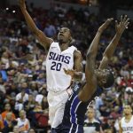 Phoenix Suns' Josh Jackson shoots as Dallas Mavericks' Jalen Jones defends during the second half of an NBA summer league basketball game Friday, July 6, 2018, in Las Vegas. (AP Photo/John Locher)