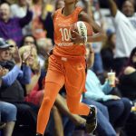 Connecticut Sun guard Courtney Williams celebrates after being fouled while collecting a defensive rebound in the closing seconds against the Phoenix Mercury in the second half of WNBA basketball game action Friday, July 13, 2018, in Uncasville, Conn. (Sean D. Elliot/The Day via AP)