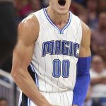 In this Wednesday, Jan. 4, 2017, photo, Orlando Magic forward Aaron Gordon celebrates after hitting a 3-point shot against the Atlanta Hawks during an NBA basketball game in Orlando, Fla. On Sunday, July 1, 2018, Gordon agreed to a four-year deal to stay with the Magic. (Stephen M. Dowell/Orlando Sentinel via AP)