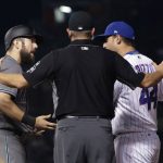 First base umpire Chad Fairchild gets between Arizona Diamondbacks' Steven Souza Jr., left, and Chicago Cubs' Anthony Rizzo as the pair have words during the ninth inning of a baseball game Tuesday, July 24, 2018, in Chicago. The Diamondbacks won 5-1. (AP Photo/Charles Rex Arbogast)