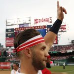 Washington Nationals Bryce Harper (34) waves to the crowd before the MLB Home Run Derby, at Nationals Park, Monday, July 16, 2018 in Washington. The 89th MLB baseball All-Star Game will be played Tuesday. (AP Photo/Alex Brandon)