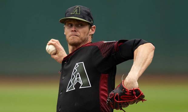 Arizona Diamondbacks starting pitcher Clay Buchholz delivers against the Oakland Athletics during t...