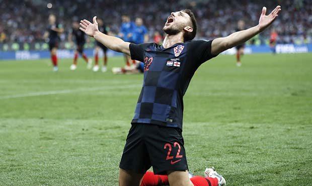 Croatia's Josip Pivaric celebrates after his team advanced to the final during the semifinal match ...