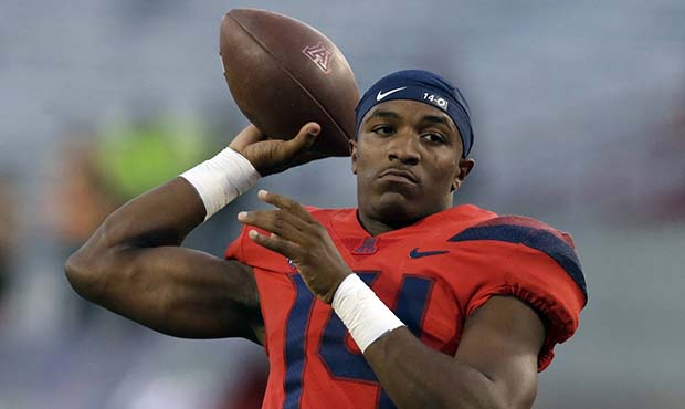 Arizona quarterback Khalil Tate warms up before an NCAA college football game against Washington St...