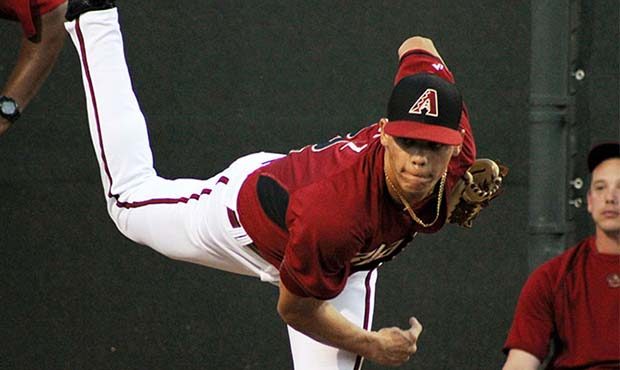 D-backs prospect Yoan Lopez wows with a strikeout and a wild hairdo