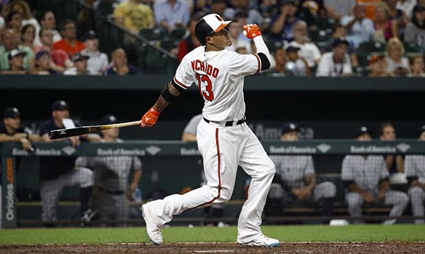 Baltimore Orioles' Manny Machado watches his two-run home run in the seventh inning of a baseball g...