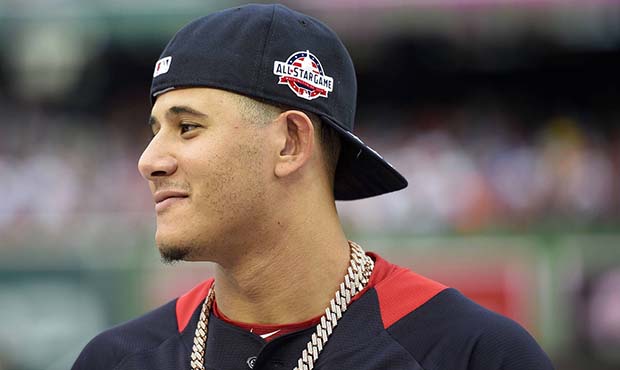 American League, Baltimore Orioles Manny Machado walks on the field after batting practice ahead of...