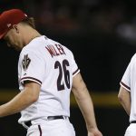 Arizona Diamondbacks starting pitcher Shelby Miller (26) is removed from the game by manager Torey Lovullo (17) during the sixth inning against the San Diego Padres on Thursday, July 5, 2018, in Phoenix. (AP Photo/Ross D. Franklin)