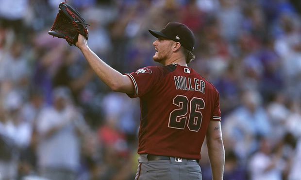 Arizona Diamondbacks starting pitcher Shelby Miller waits for a new ball after giving up a three-ru...
