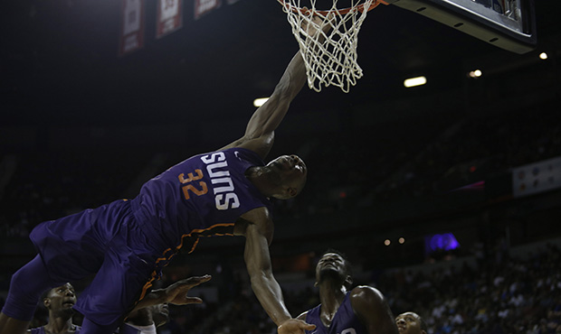 Suns second year guard Davon Reed took a fall after being fouled on a dunk attempt vs the Kings on ...