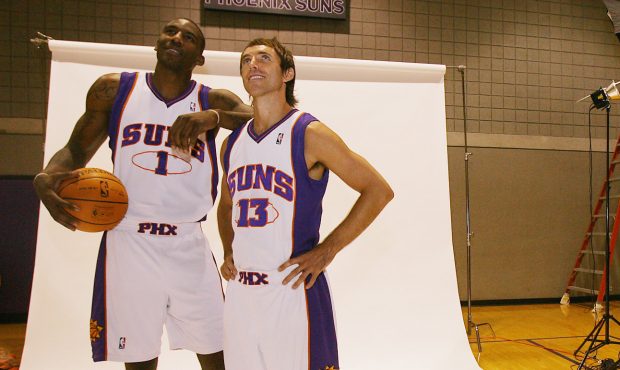 Phoenix Suns' Amare Stoudemire, left, and Steve Nash (13) pose for photographs, Monday, Oct. 1, 200...