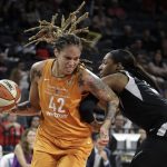 Las Vegas Aces center Kelsey Bone, right, fouls Phoenix Mercury center Brittney Griner during the first half of a WNBA basketball game Wednesday, Aug. 1, 2018, in Las Vegas. (AP Photo/John Locher)