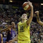 Seattle Storm's Breanna Stewart (30) grabs a rebound in front of Phoenix Mercury's DeWanna Bonner during the second half of Game 1 of a WNBA basketball playoff semifinal Sunday, Aug. 26, 2018, in Seattle. The Storm won 91-87. (AP Photo/Elaine Thompson)