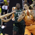 Phoenix Mercury's Brittney Griner (42) is doubled-teamed by Seattle Storm's Sue Bird, left, and Natasha Howard (6) in the first half in a WNBA basketball playoff semifinal Tuesday, Aug. 28, 2018, in Seattle. (AP Photo/Elaine Thompson)