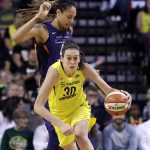 Seattle Storm's Breanna Stewart (30) races ahead of Phoenix Mercury's Brittney Griner in the first half of a WNBA basketball playoff semifinal Sunday, Aug. 26, 2018, in Seattle. (AP Photo/Elaine Thompson)