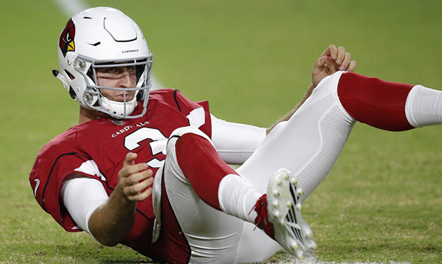 Arizona Cardinals quarterback Josh Rosen (3) watches his throw after being hit against the Los Ange...