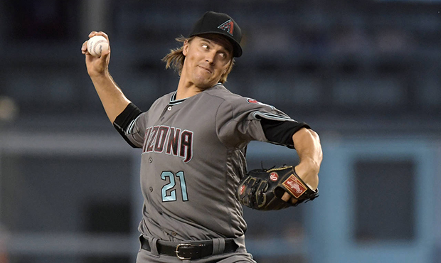 Arizona Diamondbacks starting pitcher Zack Greinke throws to the plate during the first inning of a...