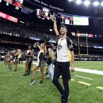 Jesse Hernandez, the first male member of the New Orleans Saints dance team "The Saintsations," performs in the second half of an NFL preseason football game against the Arizona Cardinals in New Orleans, Friday, Aug. 17, 2018. He is one of the first male cheerleaders in the NFL. (AP Photo/Bill Feig)