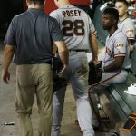 After sustaining an injury, San Francisco Giants' Buster Posey (28) leaves the game with a member of the training staff as they walk past Andrew McCutchen, second from right, and Chris Stratton, right, during the third inning of a baseball game against the Arizona Diamondbacks on Friday, Aug. 3, 2018, in Phoenix. (AP Photo/Ross D. Franklin)