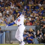 Los Angeles Dodgers' Justin Turner watches his solo home run against the Arizona Diamondbacks during the eighth inning of a baseball game Friday, Aug. 31, 2018, in Los Angeles. (AP Photo/Mark J. Terrill)