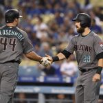 Arizona Diamondbacks' Paul Goldschmidt, left, is congratulated by Steven Souza Jr. after hitting a two-run home run during the first inning of a baseball game against the Los Angeles Dodgers, Friday, Aug. 31, 2018, in Los Angeles. (AP Photo/Mark J. Terrill)