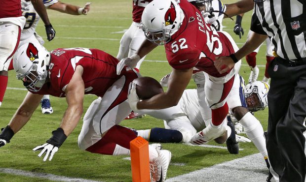 Arizona Cardinals linebacker Jeremy Cash (52) runs back a fumble recovery for a touchdown against t...