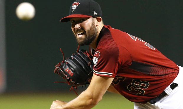 Arizona Diamondbacks pitcher Robbie Ray throws in the first inning of a baseball game against the S...