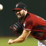 Arizona Diamondbacks pitcher Robbie Ray throws in the first inning of a baseball game against the San Francisco Giants, Sunday, Aug. 5, 2018, in Phoenix. (AP Photo/Rick Scuteri)