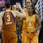 Phoenix Mercury guard Yvonne Turner (6) celebrates her score against the Seattle Storm with guard Diana Taurasi (3) and center Brittney Griner during the second half of Game 3 of a WNBA basketball playoffs semifinal Friday, Aug. 31, 2018, in Phoenix. The Mercury defeated the Storm 86-66. (AP Photo/Ross D. Franklin)