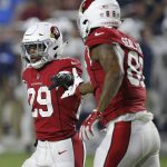 Arizona Cardinals running back Chase Edmonds (29) celebrates his touchdown with teammate tight end Ricky Seals-Jones (86) during the first half of an preseason NFL football game, Saturday, Aug. 11, 2018, in Glendale, Ariz. (AP Photo/Ross D. Franklin)