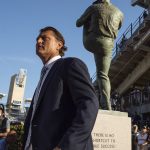 Trevor Hoffman stands next to his statue before a baseball game against the Arizona Diamondbacks in San Diego, Saturday, Aug. 18, 2018. (AP Photo/Kyusung Gong)