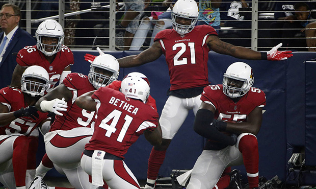 Arizona Cardinals defensive back Patrick Peterson (21) celebrates after scoring a touchdown on an i...
