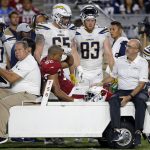 Arizona Cardinals linebacker Jeremy Cash (52) leaves the field after being injured during the second half of a preseason NFL football game against the Los Angeles Chargers, Saturday, Aug. 11, 2018, in Glendale, Ariz. (AP Photo/Ross D. Franklin)