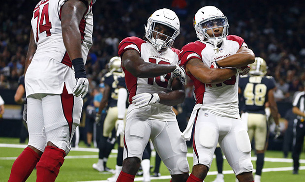 Arizona Cardinals wide receiver Christian Kirk, right, celebrates his touchdown reception with wide...