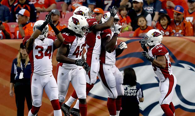 From left; Arizona Cardinals free safety Harlan Miller (34), linebacker Cap Capi (42), free safety ...