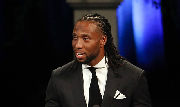 Larry Fitzgerald, wide receiver for the Arizona Cardinals, gives a tribute during memorial service ...